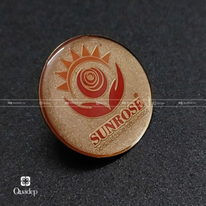 huy hiệu đồng ăn mòn